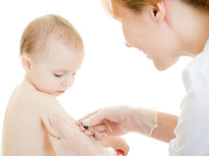 Doctor Vaccinating A Baby