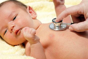 Stethoscope on baby's chest