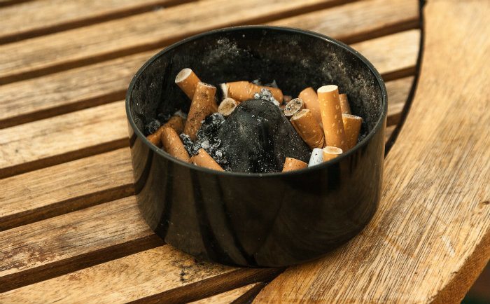 Ashtray with cigarette butts